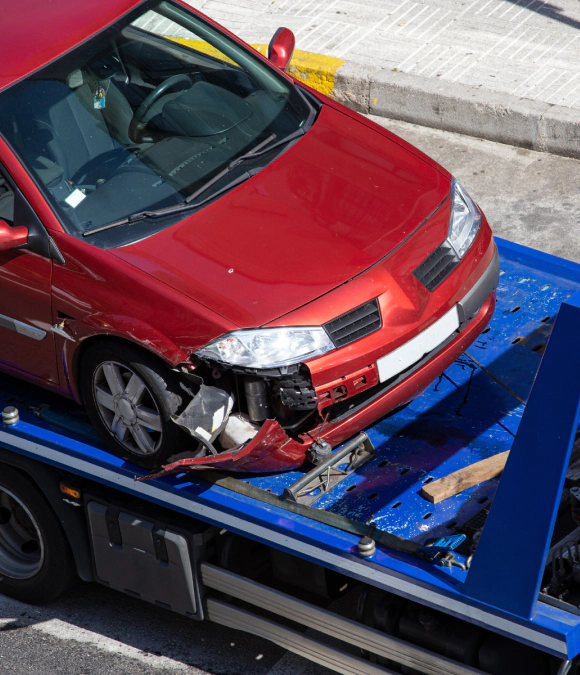 red car being hauled3